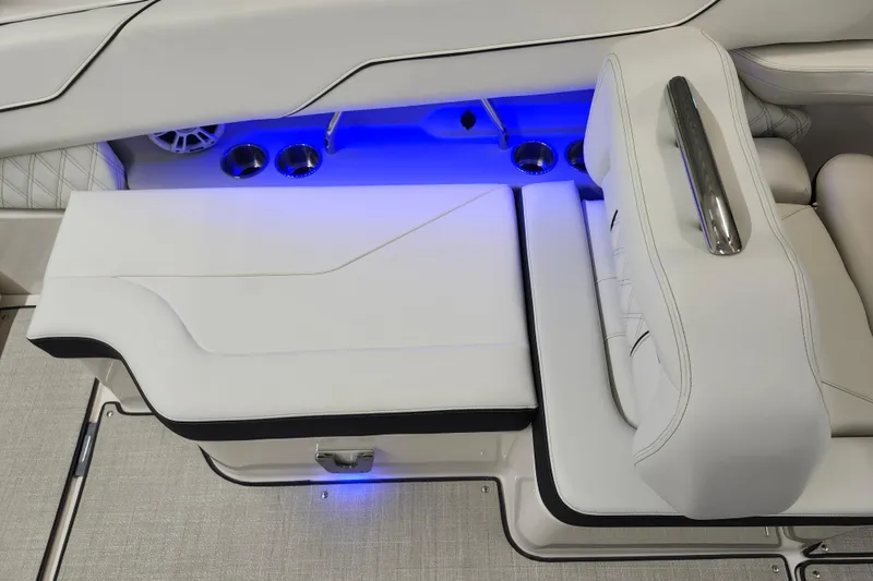  Yacht Photos Pics Luxurious white seating with blue LED lighting in 2025 Regal LX4 boat.