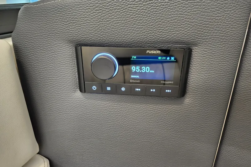  Yacht Photos Pics 2025 Regal LX4 audio system with Fusion radio display, featuring FM and Bluetooth options.