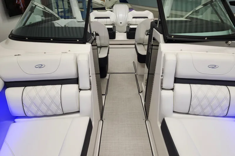  Yacht Photos Pics 2025 Regal LX4 boat interior with luxurious white seating and modern design.