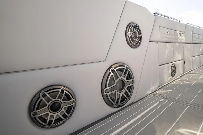  Yacht Photos Pics 2026 Cigarette 42' Auroris boat interior with sleek speaker system and modern design.