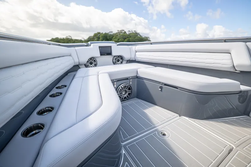  Yacht Photos Pics Luxurious interior of 2026 Cigarette 42' Auroris boat with sleek seating and modern design.