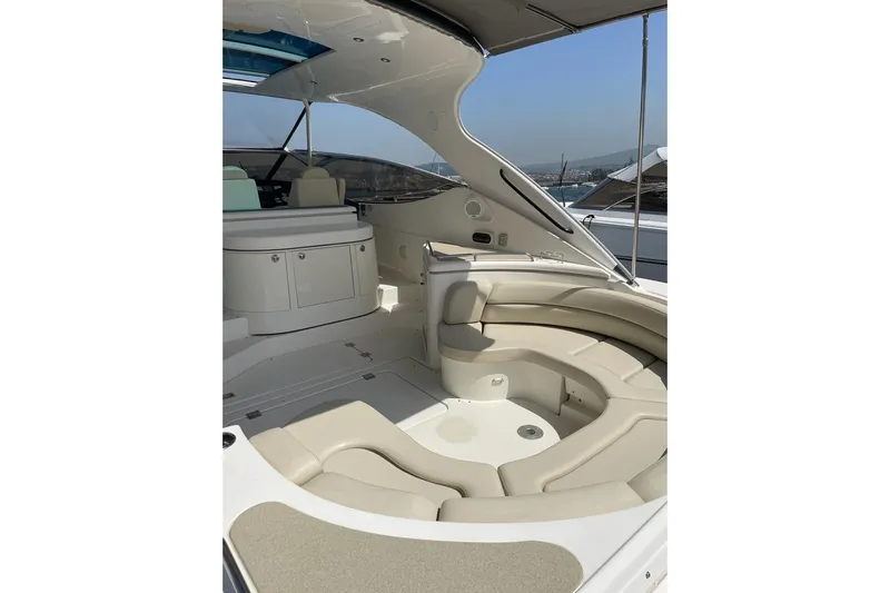  Yacht Photos Pics 2003 Cruisers Yachts 5470 Express interior with luxurious seating and modern design.