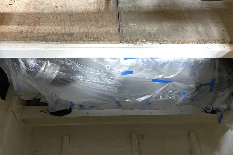  Yacht Photos Pics 1983 Viking Boats Sportfish 46 Sedan Bridge engine covered in plastic wrap.