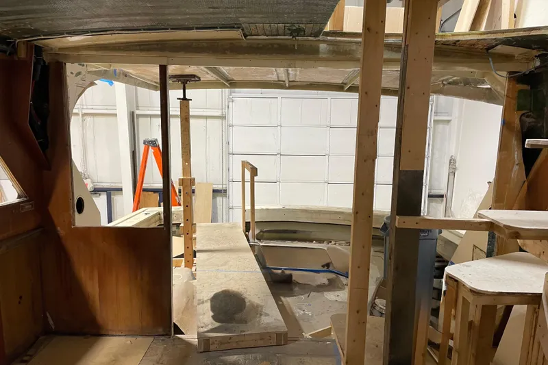  Yacht Photos Pics 1983 Viking Boats Sportfish 46 Sedan Bridge under renovation in a workshop.