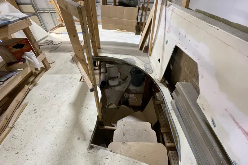  Yacht Photos Pics 1983 Viking Boats Sportfish 46 Sedan Bridge under renovation in a workshop.