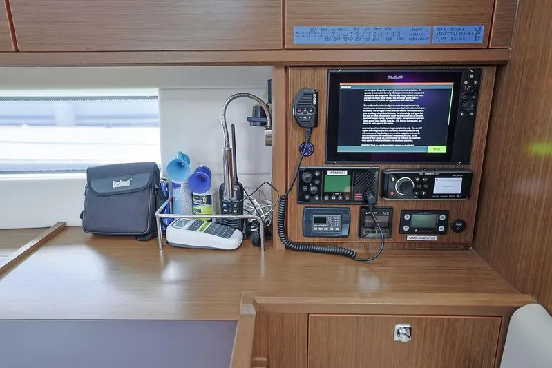 Das Boot Yacht Photos Pics Navigation equipment on a 2020 Bavaria C57 yacht, featuring communication devices and control panels.
