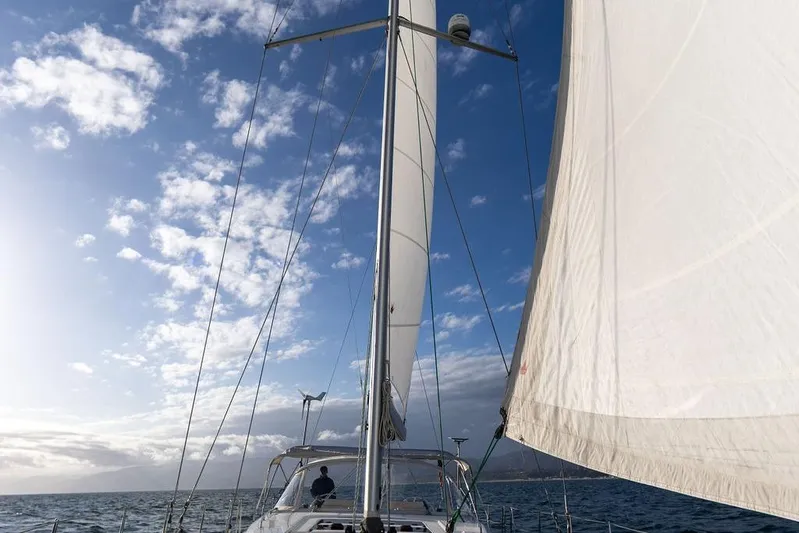 Das Boot Yacht Photos Pics Sailing on a 2020 Bavaria C57 yacht under a clear blue sky.