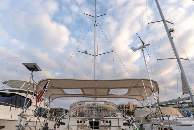Das Boot Yacht Photos Pics Sailboat Bavaria C57, 2020 model, docked at marina under cloudy sky.