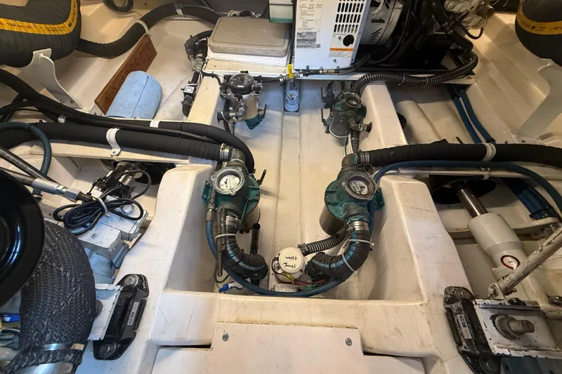 Starlite Yacht Photos Pics Engine room of 2008 Legacy Yachts 42, showcasing mechanical components and piping.