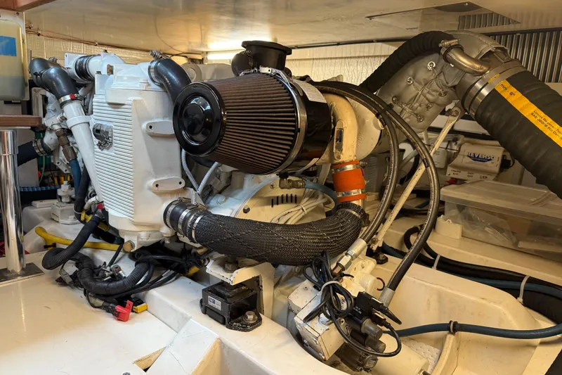 Starlite Yacht Photos Pics Engine room of 2008 Legacy Yachts 42 Extended Hardtop Flybridge, showcasing mechanical components.