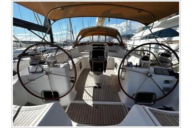  Yacht Photos Pics Cockpit view of 2004 Jeanneau Sun Odyssey 54 DS sailboat with dual steering wheels.