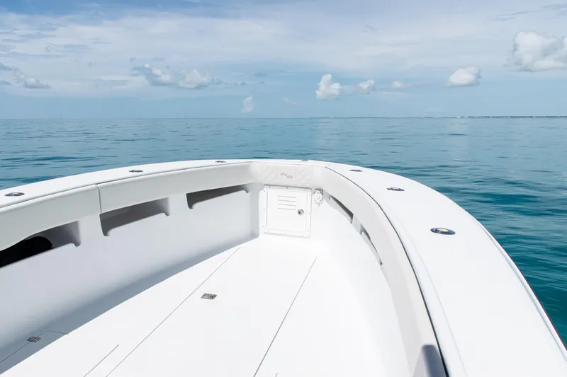  Yacht Photos Pics 2006 SeaVee 340B boat on calm ocean waters under a clear sky.