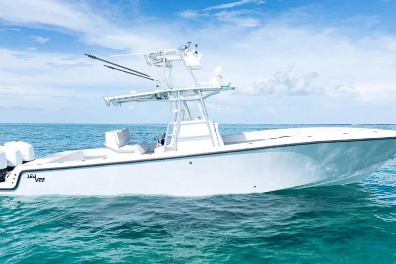  Yacht Photos Pics 2006 SeaVee 340B boat on clear blue ocean under a bright sky.