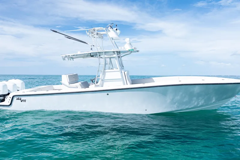  Yacht Photos Pics 2006 SeaVee 340B boat on clear blue ocean under a bright sky.