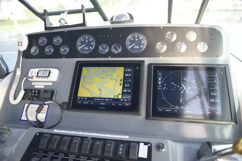 Sprout Yacht Photos Pics Dashboard of a 1995 Tiara Yachts 4000 Express with navigation screens and gauges.