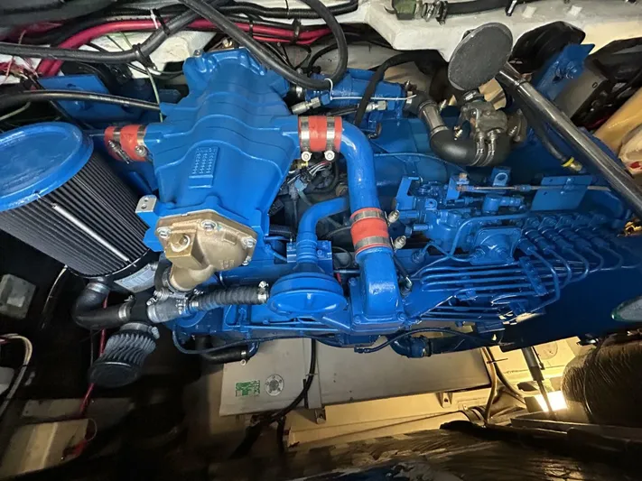 Sprout Yacht Photos Pics 1995 Tiara Yachts 4000 Express engine compartment with blue marine engine.