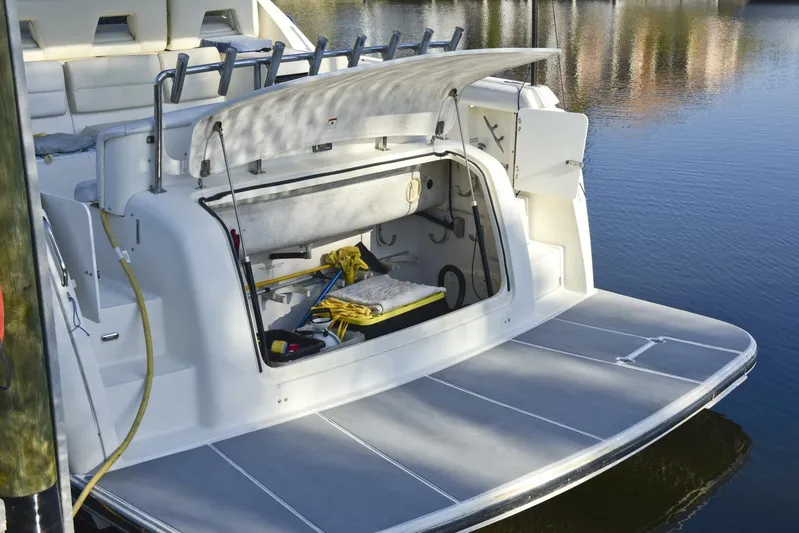 Sprout Yacht Photos Pics 1995 Tiara Yachts 4000 Express with open storage compartment at the stern.