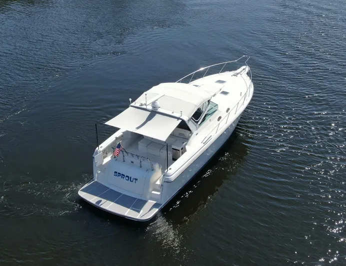 Sprout Yacht Photos Pics 1995 Tiara Yachts 4000 Express cruising on water.