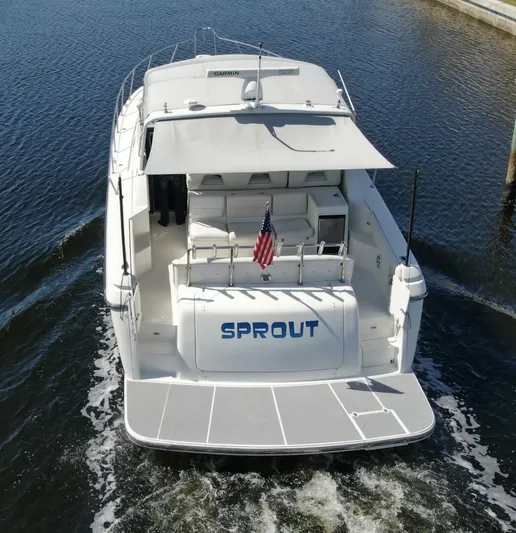 Sprout Yacht Photos Pics 1995 Tiara Yachts 4000 Express boat named Sprout cruising on water.