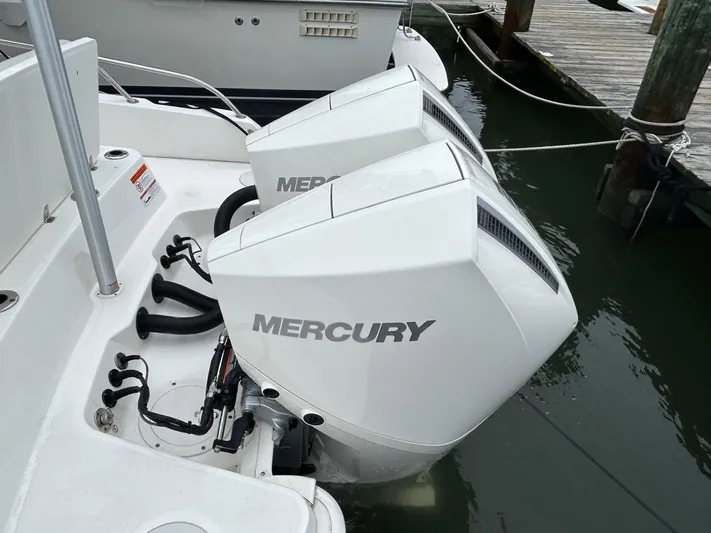  Yacht Photos Pics Twin Mercury outboard engines on a 2022 Boston Whaler 27 Dauntless boat.