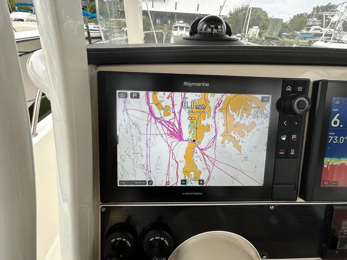  Yacht Photos Pics Navigation display on 2022 Boston Whaler 27 Dauntless boat, showing detailed marine chart.