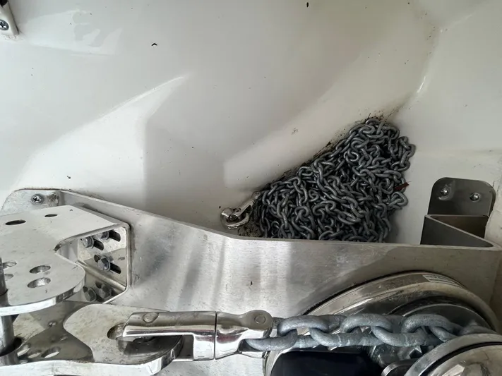  Yacht Photos Pics Anchor chain and winch on a 2022 Boston Whaler 27 Dauntless boat.