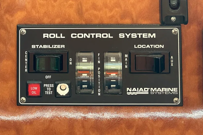Dancing Lady Yacht Photos Pics Control panel of Naiad Marine Systems roll control on 1999 Horizon 70 Motor Yacht.