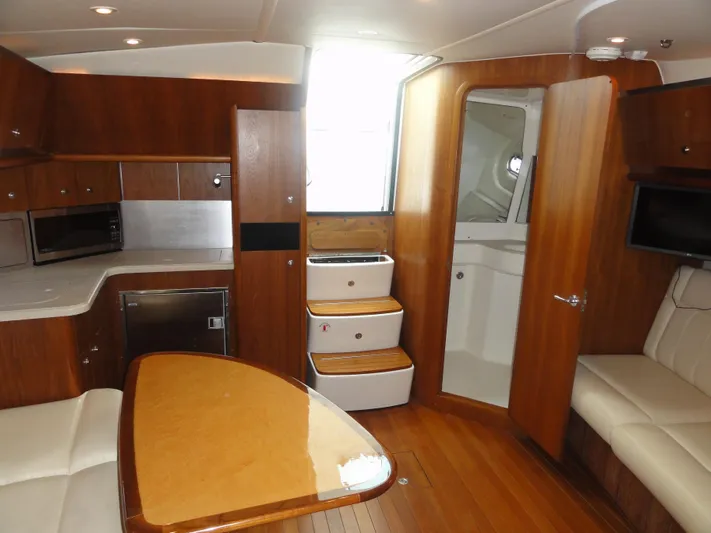  Yacht Photos Pics Interior of 2006 Tiara Yachts 3600 Sovran, featuring wood finishes and modern amenities.