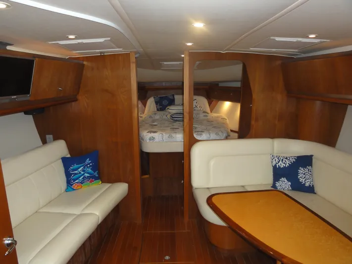  Yacht Photos Pics 2006 Tiara Yachts 3600 Sovran interior with cozy seating and elegant wood finish.