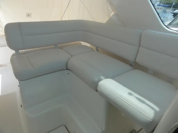  Yacht Photos Pics 2006 Tiara Yachts 3600 Sovran interior seating, featuring plush white upholstery.