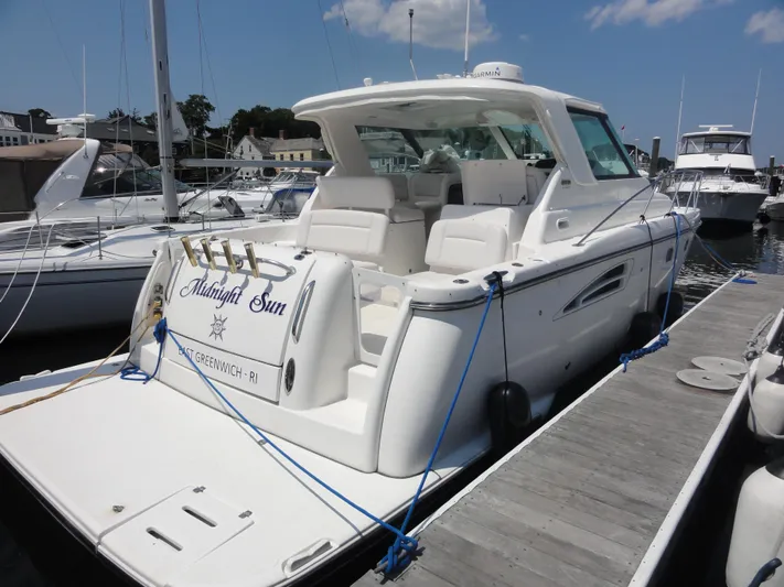  Yacht Photos Pics 2006 Tiara Yachts 3600 Sovran docked, featuring sleek design and spacious deck.