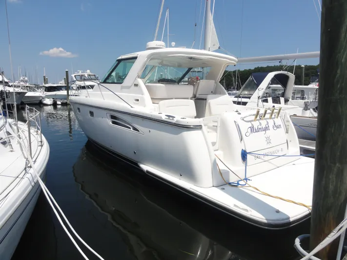  Yacht Photos Pics 2006 Tiara Yachts 3600 Sovran docked at marina under clear blue sky.