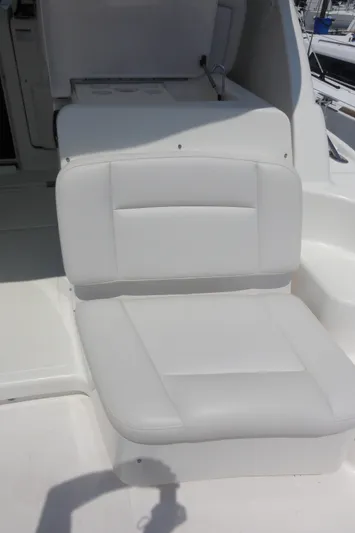  Yacht Photos Pics White cushioned seat on 2006 Tiara Yachts 3600 Sovran boat deck.