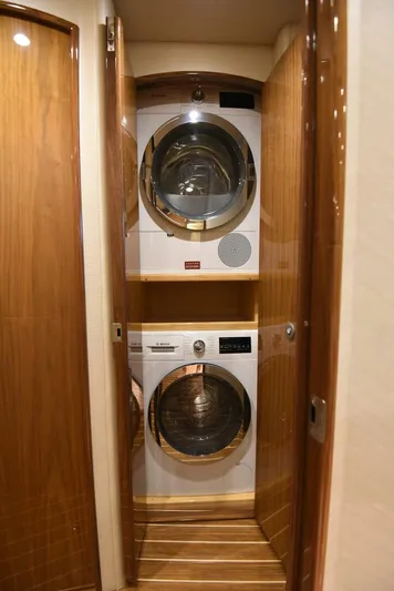 Lena Maria Yacht Photos Pics 2020 Viking 58 Convertible yacht laundry area with stacked washer and dryer.