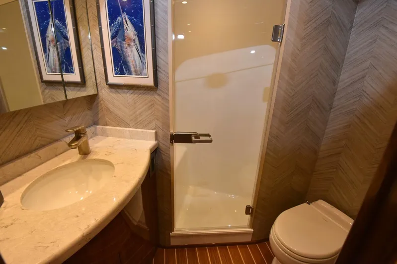 Lena Maria Yacht Photos Pics Luxurious bathroom in 2020 Viking 58 Convertible yacht with shower and elegant decor.