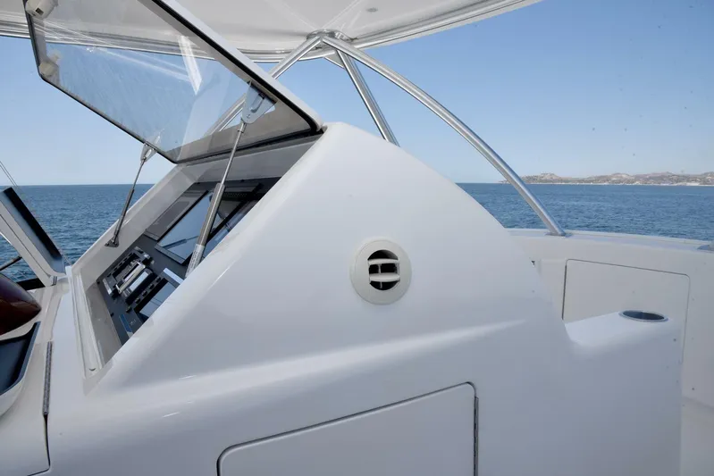 Lena Maria Yacht Photos Pics Control panel of 2020 Viking 58 Convertible yacht with ocean view.