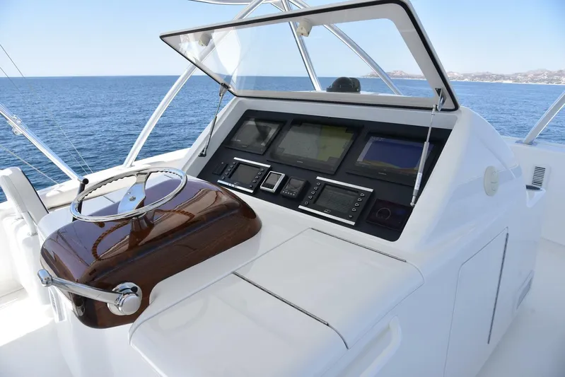 Lena Maria Yacht Photos Pics Helm of 2020 Viking 58 Convertible yacht with ocean view.