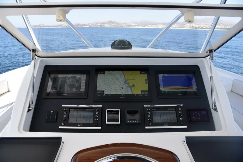 Lena Maria Yacht Photos Pics Cockpit of 2020 Viking 58 Convertible yacht with advanced navigation displays.