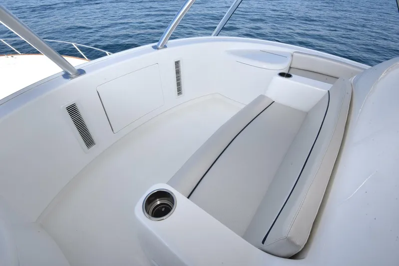 Lena Maria Yacht Photos Pics 2020 Viking 58 Convertible boat seating area with ocean view.