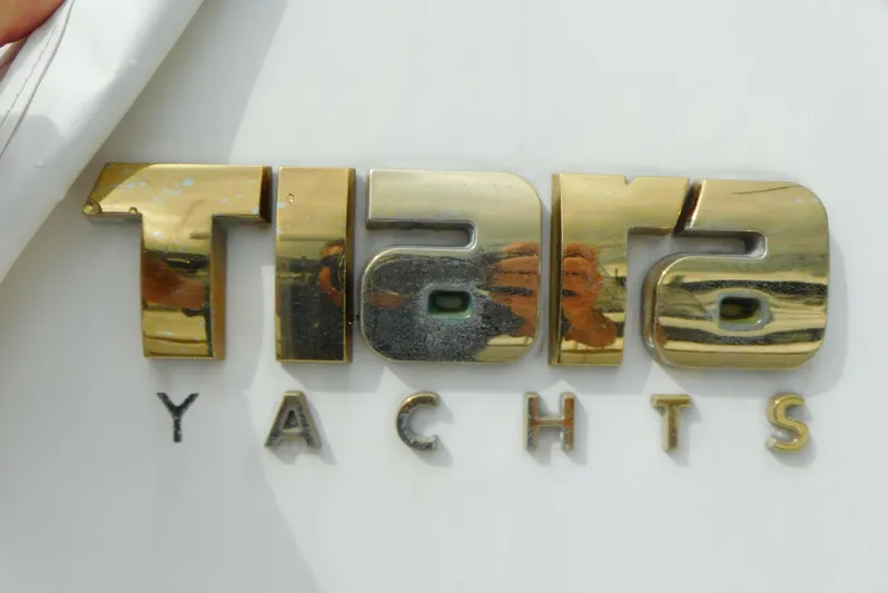  Yacht Photos Pics Gold Tiara Yachts logo on a 2006 Tiara 3600 Sovran.