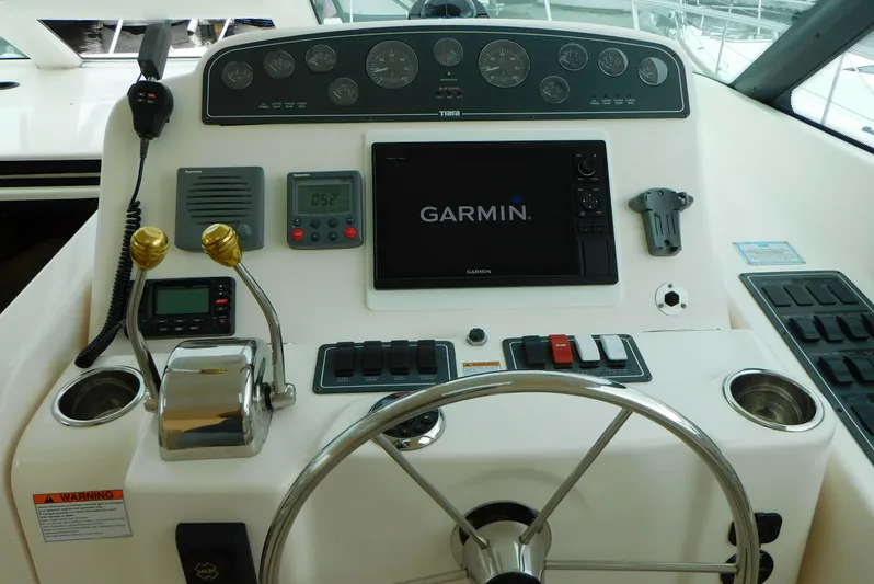  Yacht Photos Pics Helm of 2006 Tiara Yachts 3600 Sovran with Garmin navigation system and controls.