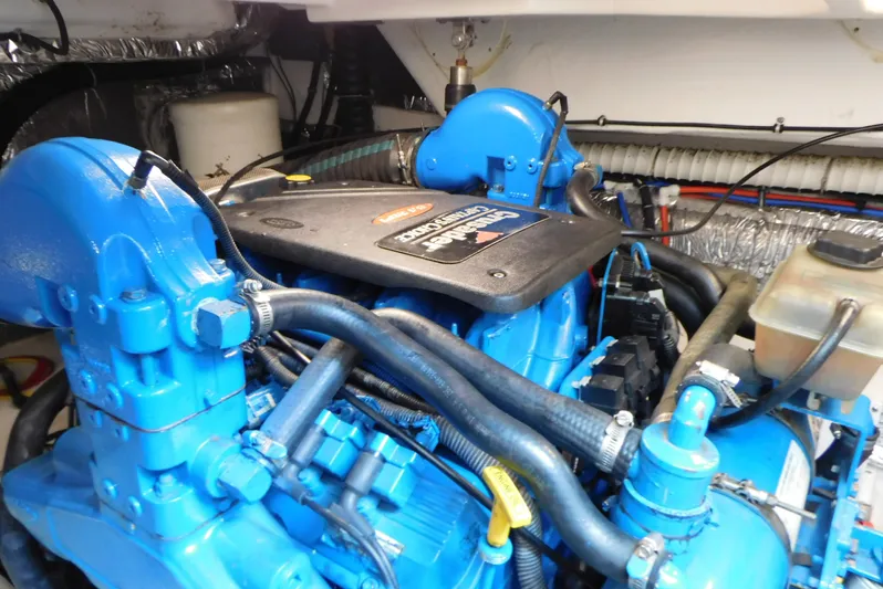 Yacht Photos Pics Engine compartment of a 2006 Tiara Yachts 3600 Sovran, featuring a blue marine engine.