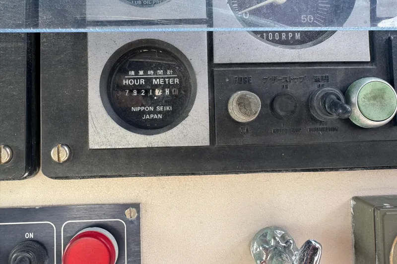 &Eacute;toile De Mer Yacht Photos Pics Control panel of a 2002 Leopard 42 with hour meter and switches.