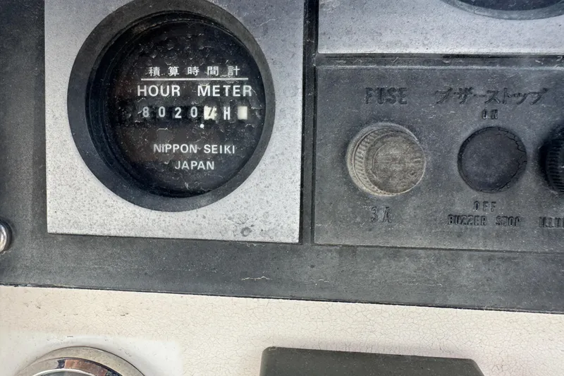 &Eacute;toile De Mer Yacht Photos Pics Hour meter panel on a 2002 Leopard 42, showing 8020 hours, Nippon Seiki Japan.