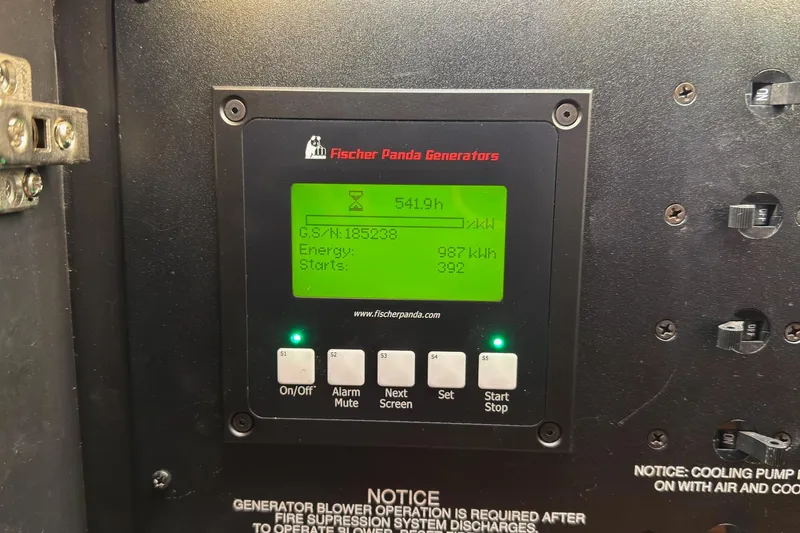  Yacht Photos Pics Fischer Panda generator display on 2019 Pursuit S 408 Sport boat, showing operational data.