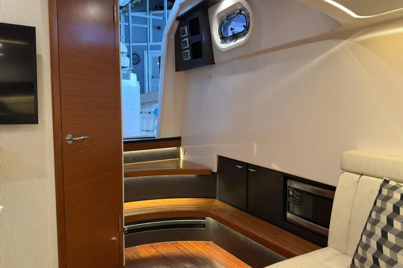  Yacht Photos Pics Luxurious interior of 2019 Pursuit S 408 Sport boat with modern amenities.