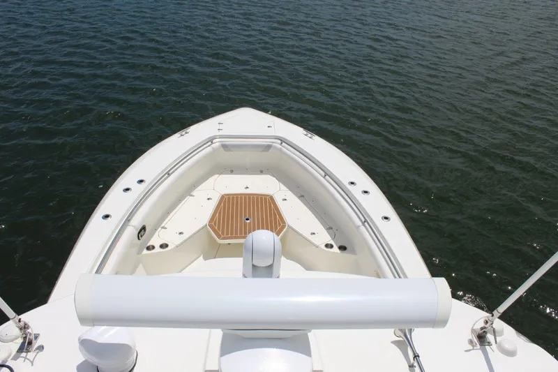  Yacht Photos Pics 2013 Boston Whaler 370 Outrage boat bow on water, featuring spacious deck.