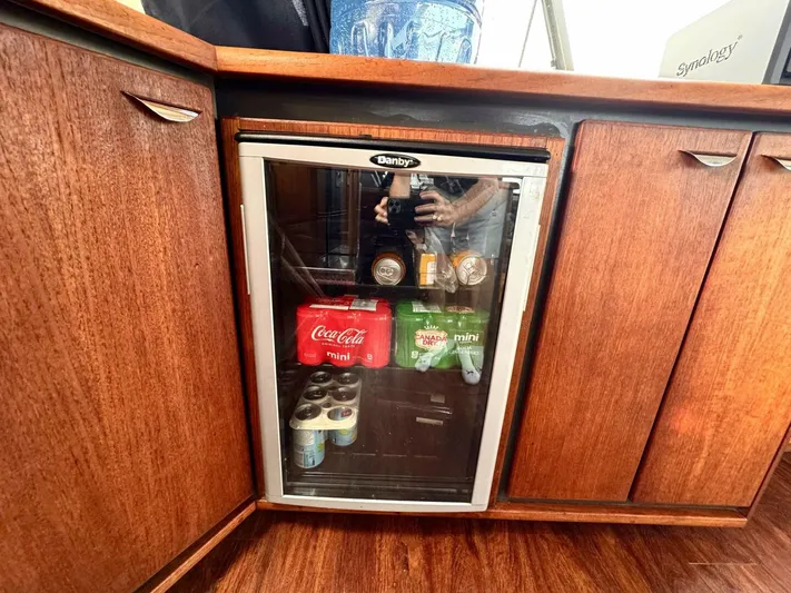  Yacht Photos Pics Mini fridge stocked with drinks inside a 1988 Bayliner 4550/4558 Pilothouse yacht.