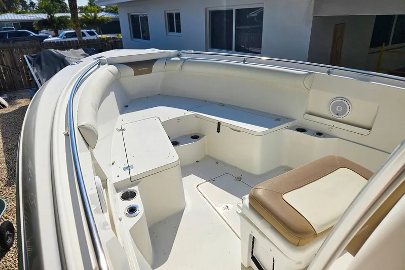 Buddy Yacht Photos Pics 2013 Sailfish 290 CC boat interior with seating and storage compartments.