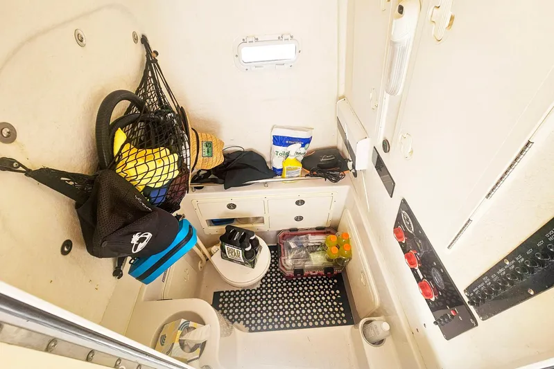 Buddy Yacht Photos Pics Interior of 2013 Sailfish 290 CC boat with storage and supplies.